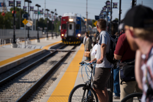 Passengers awaiting the arrival of a FrontRunner train.